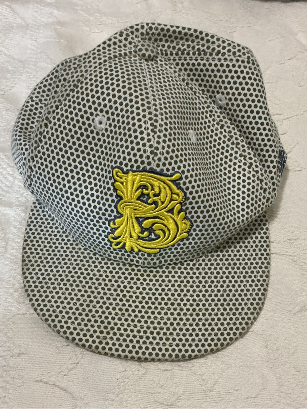 Grey and cream polka dot cap